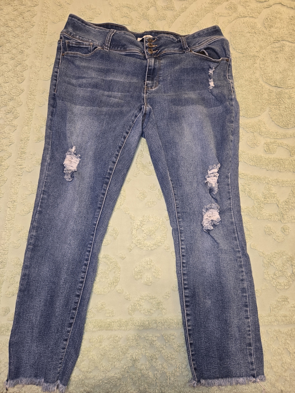 High-Rise Distressed Skinny Jeans in Faded Blue